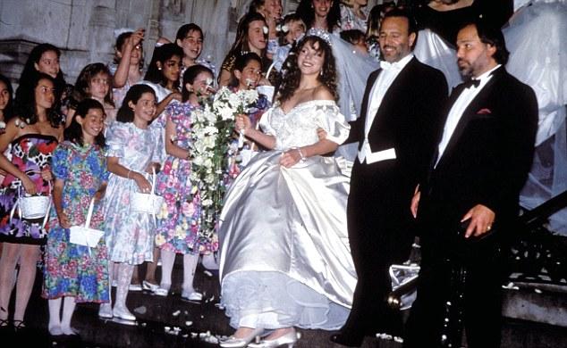 Mariah Carey and Tommy Mottola at their $500 000 wedding ceremony in 2003